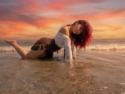Girl YumiLux taking a live spanking on her adult webcam show