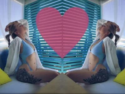 Inked model tattoos Bondgirl_013 reveals her tats in this online cam show.