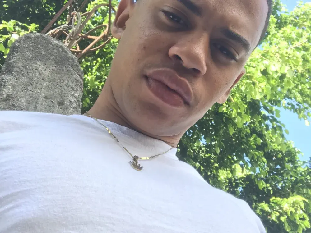 Dominican cam guys mid-stream